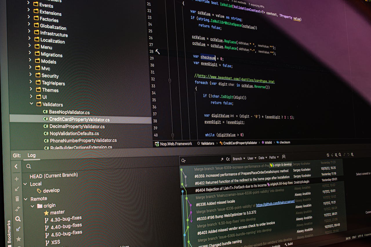 our-story-01 Close-up of software development tools displaying code and version control systems on a computer monitor.