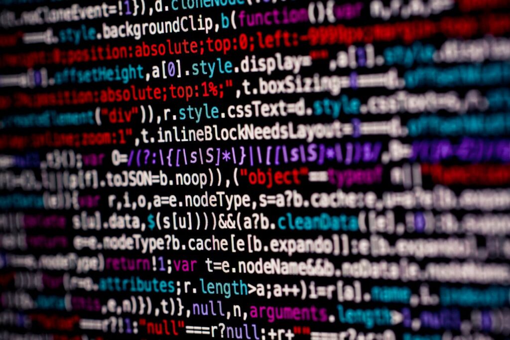 pexels photo 3872166 Close-up of multicolored code on a computer screen, highlighting programming.